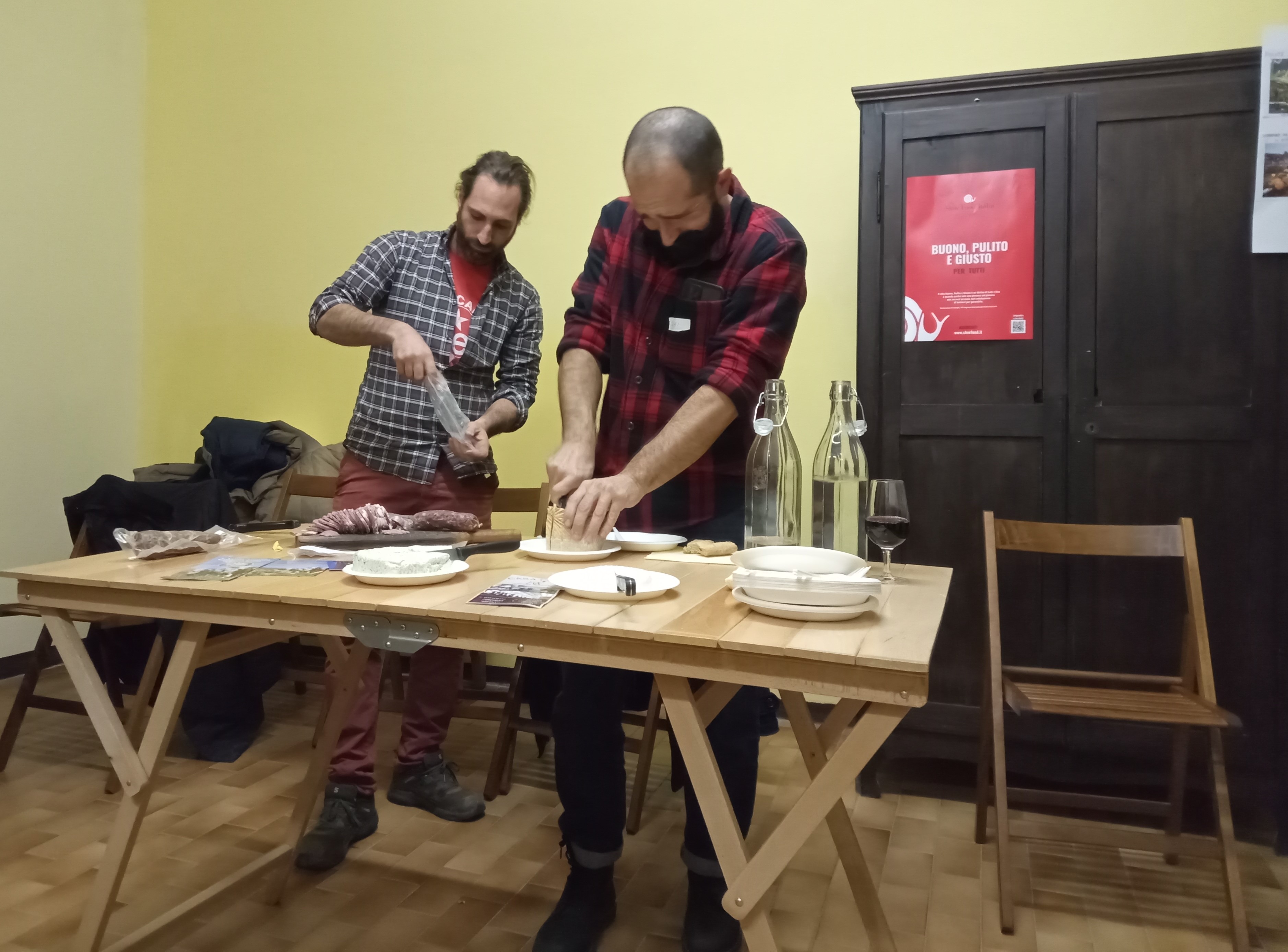 Preparing cuts of meat during a meeting.