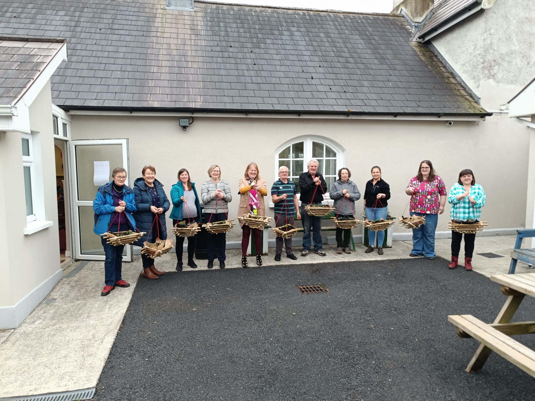 Study Circle participants building plant baskets