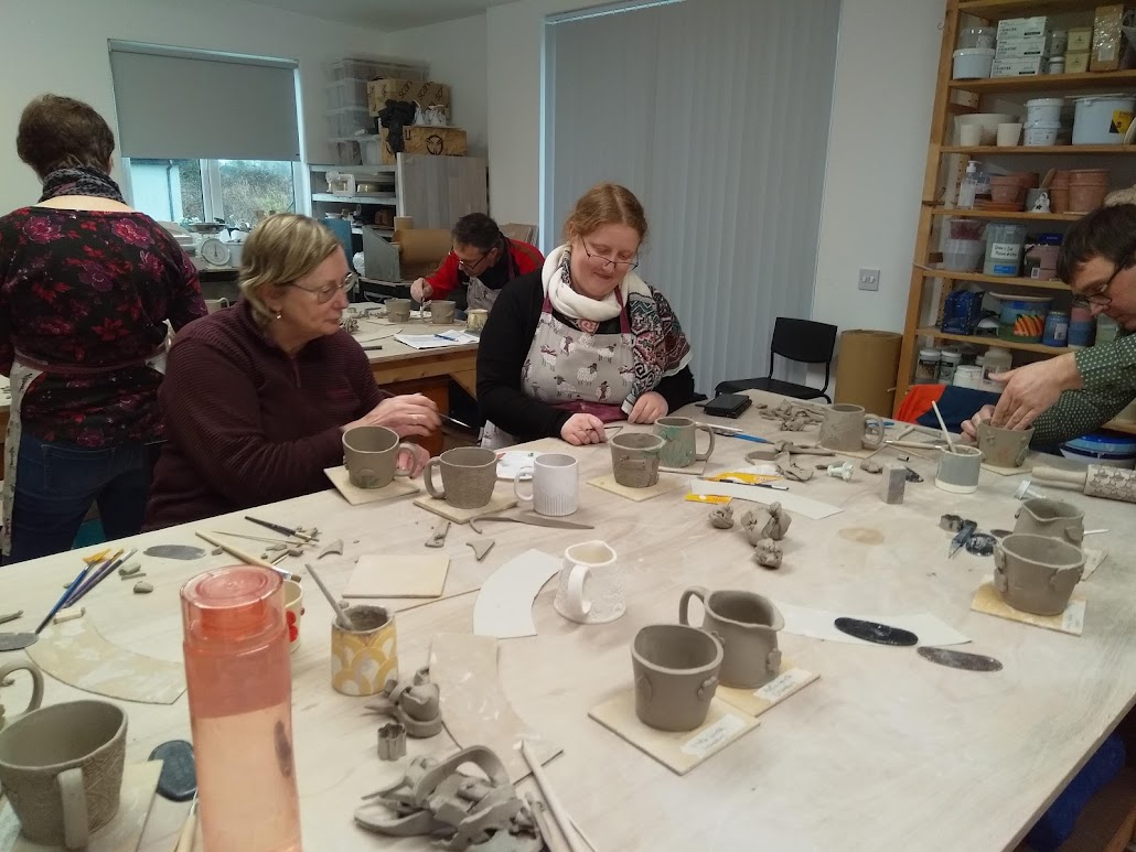 Study Circle participants making pottery