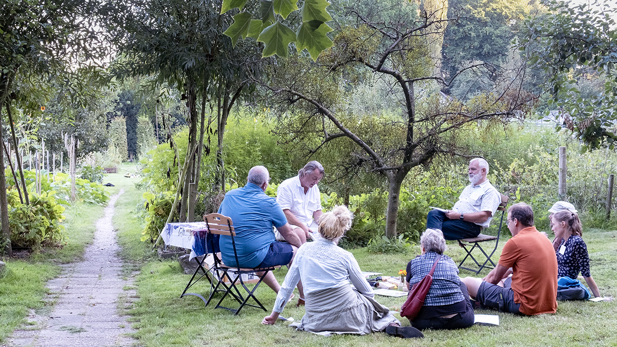 A group of people sitting in a circle