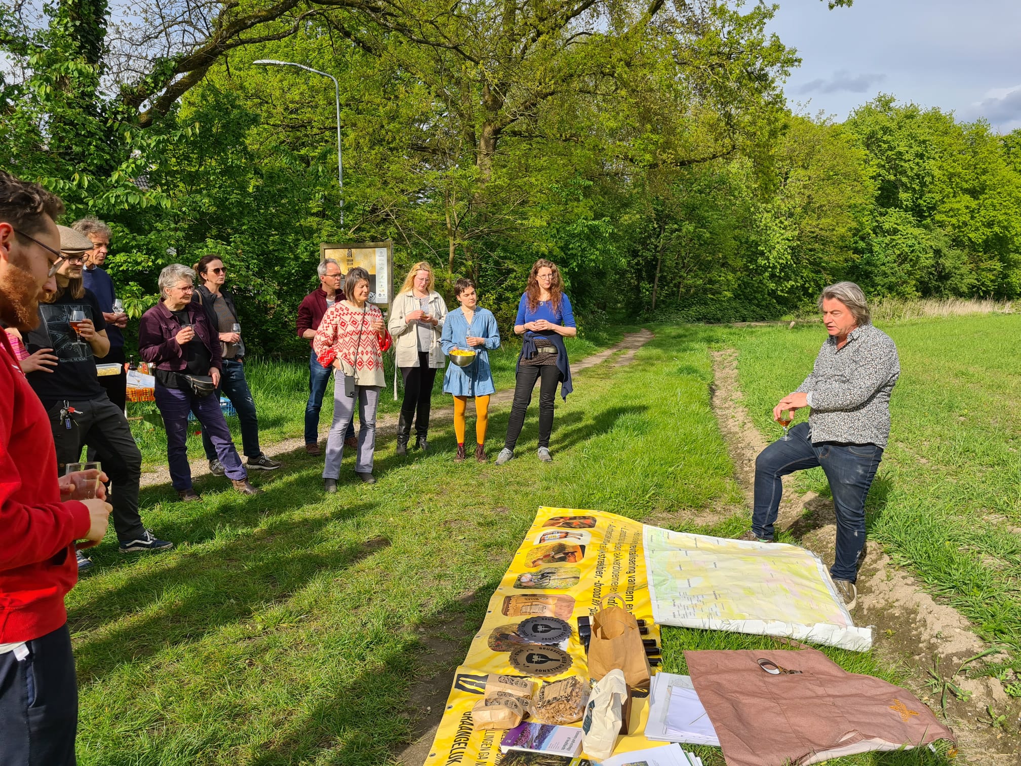 People gathering for an outdoor presentation