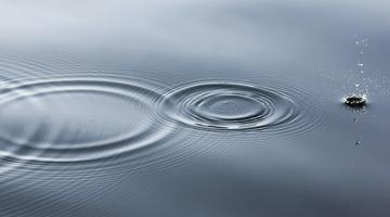 A photo of some drops in water