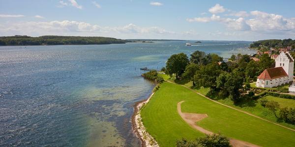 A picture of a nice Island setting, showing about two thirds water and one third green island.