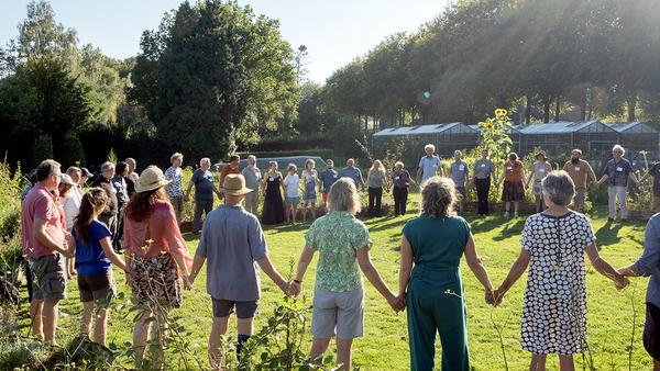 Participants forming a big circle